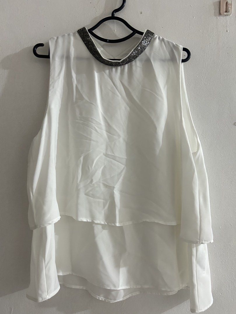 Zara Basic Collection White Sleeveless Top with Embellished Collar (Category: Sleeveless) located in Sorsogon. Submitted by jonacel (Listing ID 1454467610, Image 1). Description: - White sleeveless top from Zara Basic Collection - Size M - Layered hem detail - Beautiful embellished collar with silver beads - Perfect for dressing up or down - Pairs well with skirts or trousers.