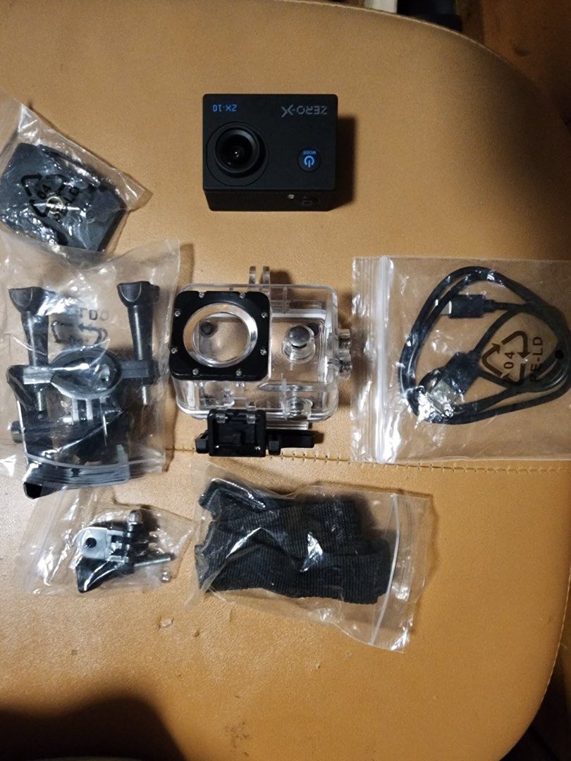 ZERO-X ZX-10 Action Camera with Accessories (Category: Cameras) located in Manila. Submitted by kathy_gonzales (Listing ID 1454482633, Image 3). Description: - ZERO-X ZX-10 Action Camera - Includes Waterproof Case - USB Cable Included - Various Mounting Accessories - Ideal for capturing adventures - All items shown in photos - Ready for its next owner Complete accessories With SD card.