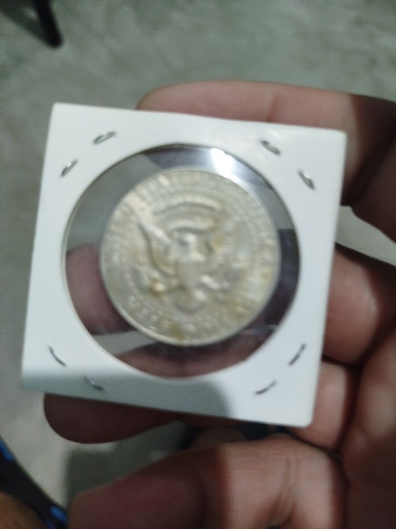 1967 Silver Kennedy Half Dollar DDR Error Coin (Category: Currency) located in Subic. Submitted by regiedaniel01 (Listing ID 1454563301, Image 2). Description: - 1967 Kennedy Half Dollar - Features a DDR (Double Die Reverse) error - Error clearly visible under magnification - Perfect for collectors of mint errors - Comes in a protective holder.