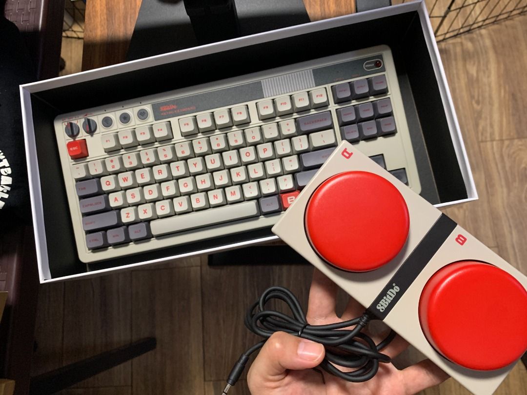 8BitDo Retro Mechanical Keyboard (N Edition) (Category: Computer Keyboard) located in Quezon City. Submitted by rafasamirgal (Listing ID 1454671718, Image 1). Description: - 8BitDo Retro Mechanical Keyboard - Connects via 2.4G wireless, USB, or Bluetooth - Unique retro gaming console-inspired design - Includes separate controller accessory - Original packaging intact - Ideal for retro gaming enthusiasts and collectors.