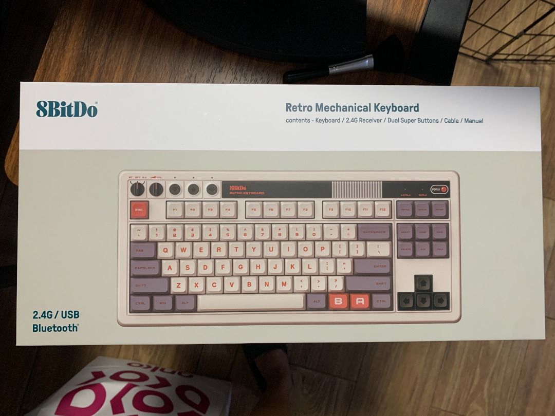 8BitDo Retro Mechanical Keyboard (N Edition) (Category: Computer Keyboard) located in Quezon City. Submitted by rafasamirgal (Listing ID 1454671718, Image 2). Description: - 8BitDo Retro Mechanical Keyboard - Connects via 2.4G wireless, USB, or Bluetooth - Unique retro gaming console-inspired design - Includes separate controller accessory - Original packaging intact - Ideal for retro gaming enthusiasts and collectors.