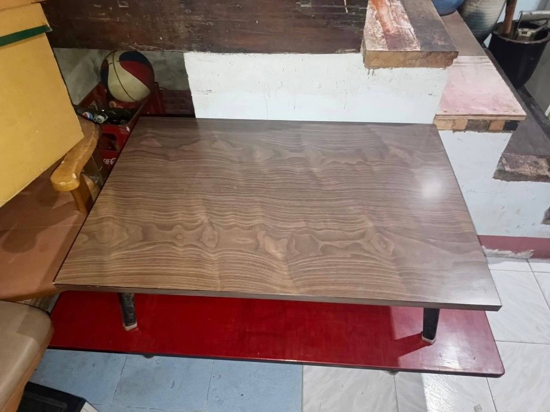🪑 Foldable Coffee Center Table – Wood Finish (Category: Tables & Sets) located in Cebu City. Submitted by turuuru8992423 (Listing ID 1454647074, Image 2). Description: 🪑 Foldable Coffee Center Table – Wood Finish 📏 Dimensions: L90 x W60 x H31 cm Description: Selling a used but sturdy foldable coffee table with a classic wood grain finish. Perfect for small spaces, apartments, or as a temporary table for gatherings, crafts, or even outdoor use.
