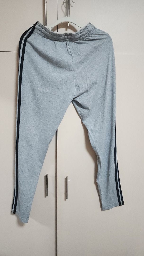 Adidas Grey Slim Three Stripes Jogger Pants (Category: Joggers) located in Mandaluyong City. Submitted by declutteriz (Listing ID 1454732115, Image 2). Description: -Size M on tag -10/10 condition -Preloved item -PM for measurements -Shipping fee not included.