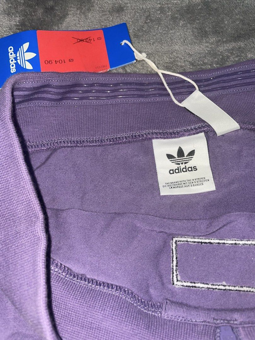 Adidas Purple Tube (Category: Others Tops) located in Rizal. Submitted by declutterwsky (Listing ID 1454740328, Image 2). Description: - Original tags still attached - Features classic Adidas logo patch - Comfortable elastic waistband - Estimated size: Small to Medium - Ideal for everyday casual wear.