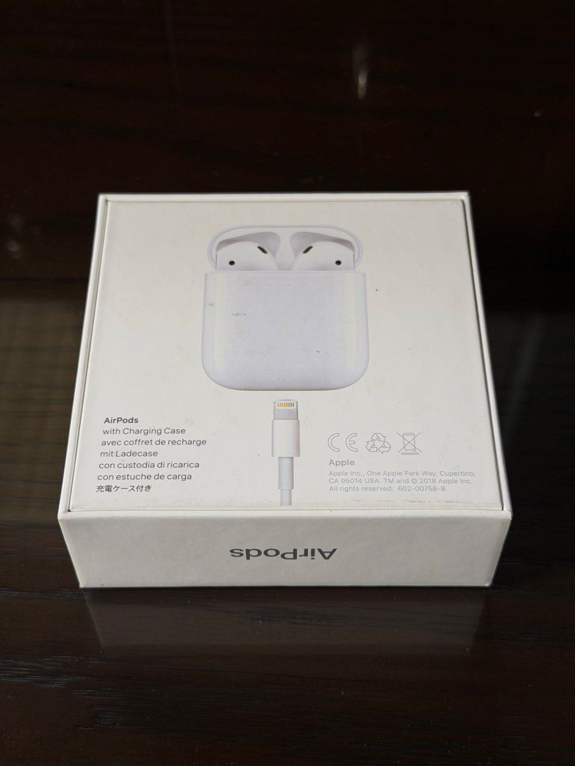 Apple AirPods (2nd Generation) (Category: Earphones) located in Taguig. Submitted by dreamstudios (Listing ID 1454626568, Image 2). Description: - Apple AirPods 1st Gen - True wireless earbuds - Seamlessly connects to Apple devices - Ideal for music listening and calls - Comes with original packaging - Battery might need replacement.