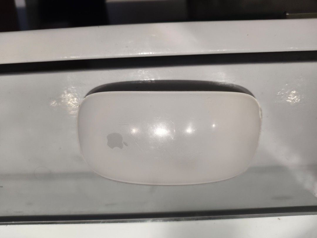 Apple Magic Mouse (USB‑C) - White Multi-Touch Surface (Category: Mouse & Mousepads) located in Quezon City. Submitted by nanayandkidspreloved (Listing ID 1454588732, Image 2). Description: Magic Mouse is wireless and rechargeable, with an optimised foot design that lets it glide smoothly across your desk. The Multi-Touch surface allows you to perform simple gestures such as swiping between web pages and scrolling through documents. The rechargeab