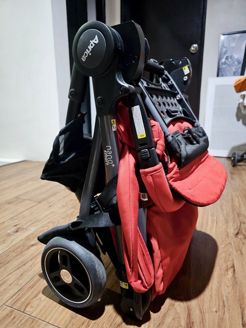 Aprica Nano Smart+ Stroller Red (Category: Strollers) located in Paranaque City. Submitted by joyzann (Listing ID 1454650353, Image 3). Description: - Lightweight and compact Aprica stroller in red. - Almost brand new condition, used maybe twice and for less than 20mins each use cause baby does not like to be in the stroller. AT ALL. - Folds down small for easy storage and travel. - Features a convenient storage basket underneath. - Includes a ca