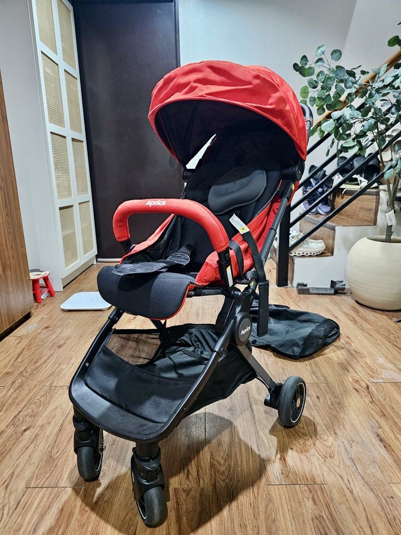 Aprica Nano Smart+ Stroller Red (Category: Strollers) located in Paranaque City. Submitted by joyzann (Listing ID 1454650353, Image 1). Description: - Lightweight and compact Aprica stroller in red. - Almost brand new condition, used maybe twice and for less than 20mins each use cause baby does not like to be in the stroller. AT ALL. - Folds down small for easy storage and travel. - Features a convenient storage basket underneath. - Includes a ca