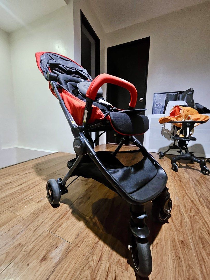 Aprica Nano Smart+ Stroller Red (Category: Strollers) located in Paranaque City. Submitted by joyzann (Listing ID 1454650353, Image 2). Description: - Lightweight and compact Aprica stroller in red. - Almost brand new condition, used maybe twice and for less than 20mins each use cause baby does not like to be in the stroller. AT ALL. - Folds down small for easy storage and travel. - Features a convenient storage basket underneath. - Includes a ca