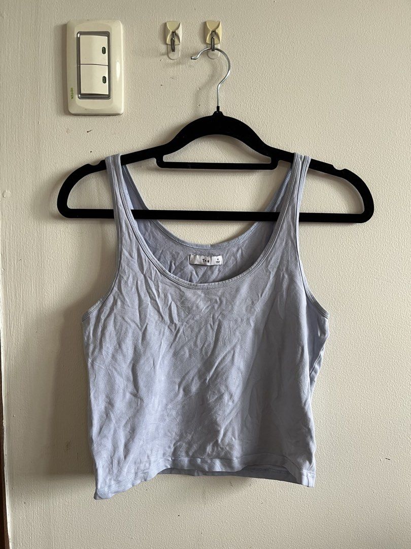 Aritzia Tna Light Blue Tank Top (Category: Sleeveless) located in Muntinlupa City. Submitted by lovedbysabel (Listing ID 1454623253, Image 1). Description: Tna light blue tank top Features a scoop neckline. Comfortable and stretchy material. Needs a little ironing/steaming.