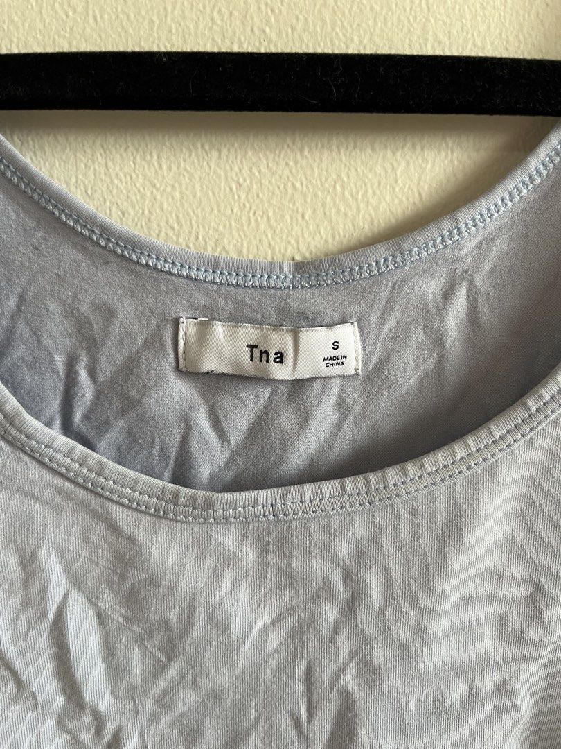 Aritzia Tna Light Blue Tank Top (Category: Sleeveless) located in Muntinlupa City. Submitted by lovedbysabel (Listing ID 1454623253, Image 2). Description: Tna light blue tank top Features a scoop neckline. Comfortable and stretchy material. Needs a little ironing/steaming.