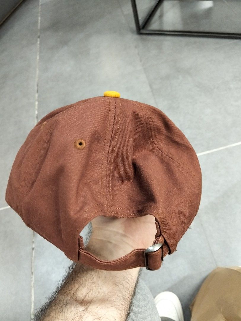 ARTWORK Cherry Embroidered Brown & Yellow Baseball Cap (Category: Caps & Hats) located in Nabunturan. Submitted by rollingon22 (Listing ID 1454635156, Image 3). Description: - Brand: ARTWORK completely brand new, never used with tag - Color: Brown cap with yellow brim - Design: Embroidered cherry on front - Features: Adjustable strap for a custom fit - Style: Casual wear .