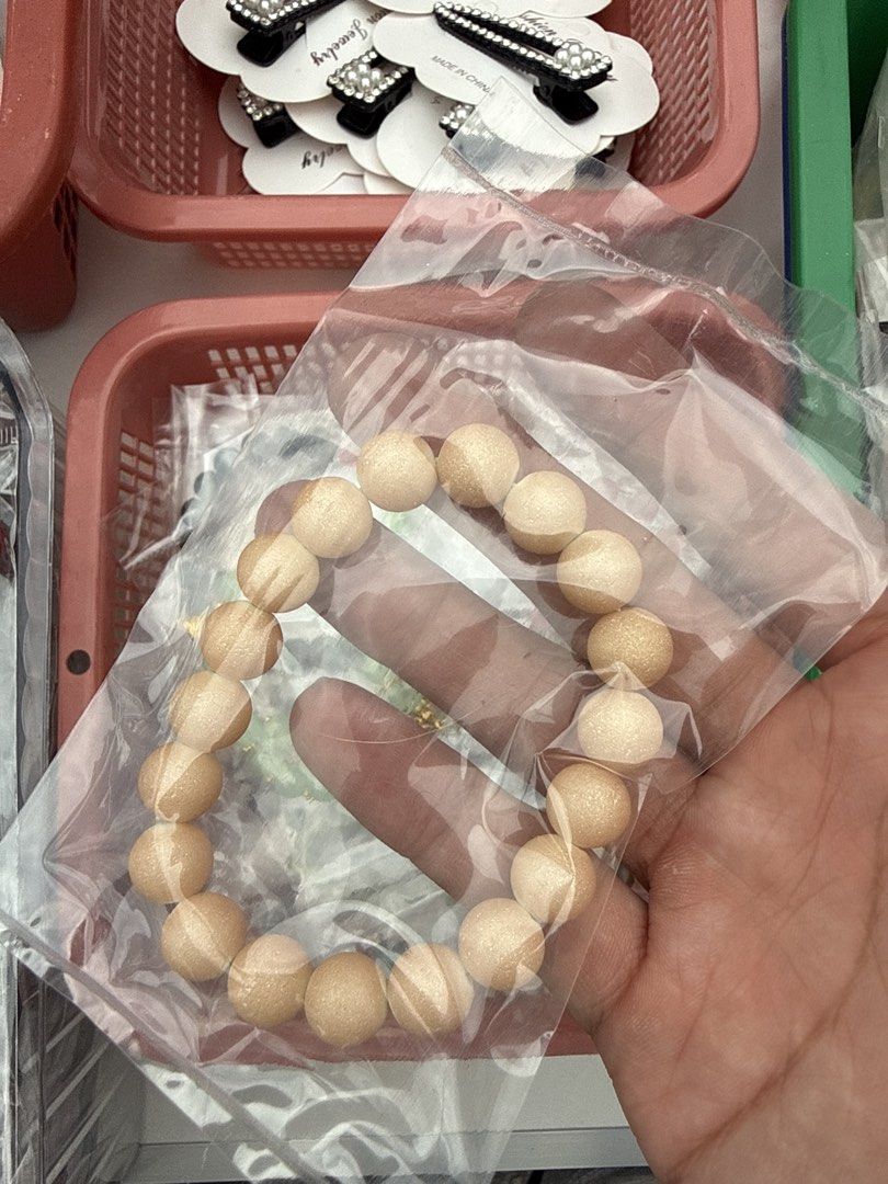 Assorted Beaded Bracelets (Category: Bracelets) located in Ampang. Submitted by edisonsam508 (Listing ID 1454561321, Image 2). Description: - Assorted beaded bracelets - Features wooden beads, pink stones, and green jade-like beads - Some bracelets include gold-tone charms - Each bracelet is individually wrapped - Ideal for stacking or as a gift .