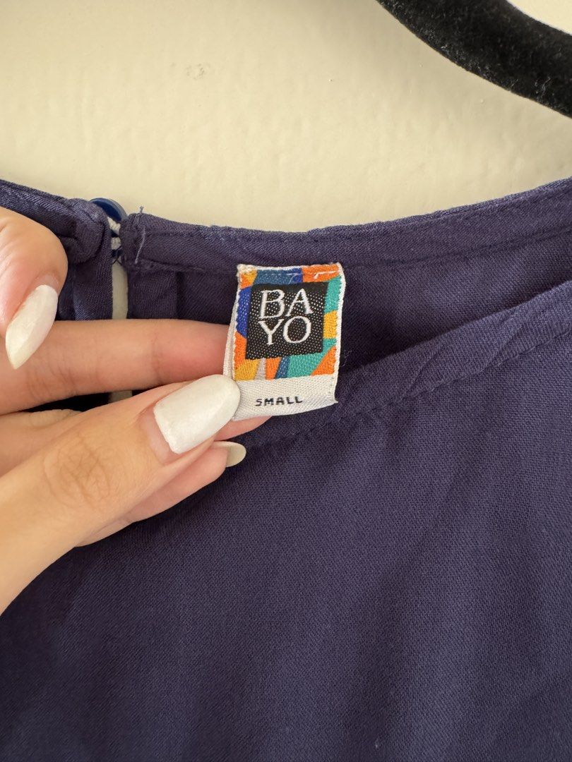 BAYO Navy Blue Short Sleeve Top (Category: Blouses) located in Quezon City. Submitted by mikarchives (Listing ID 1454652605, Image 3). Description: - BAYO navy blue top - Short sleeves with round neckline and keyhole closure at the back - Fits XS to Medium.
