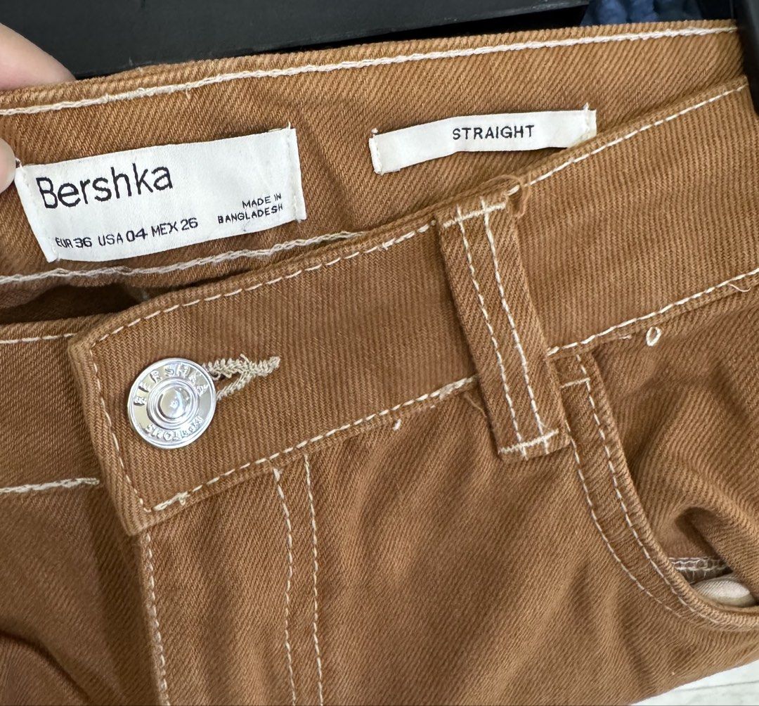 Bershka Tan / Brown Straight Leg Carpenter Pants (Category: Jeans) located in Manila. Submitted by karlahabs (Listing ID 1454725921, Image 3). Description: - Brand: Bershka - Color: Brown / Tan - Style: Carpenter Pants - Fit: Straight Leg - Features: Utility pockets, contrast stitching - Size: 4 US / 26 US - Origin: Made in Bangladesh - Occasion: Great for casual wear.