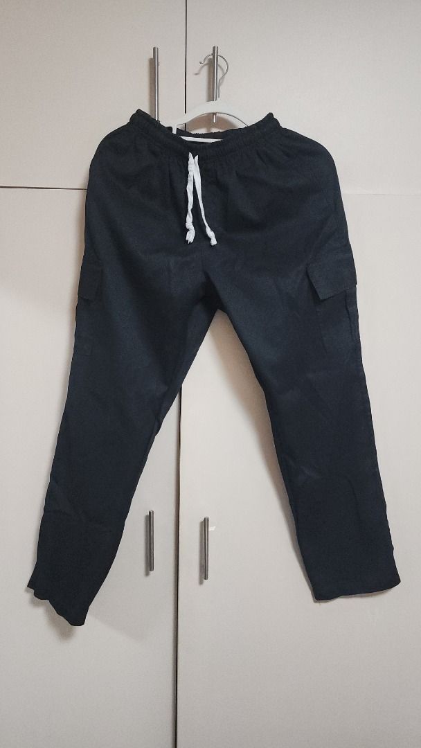 Black Cargo Pants with Drawstring Waist (Category: Joggers) located in Mandaluyong City. Submitted by declutteriz (Listing ID 1454731748, Image 2). Description: -No size, PM for measurements -10/10 condition -Preloved item -Shipping fee not included.