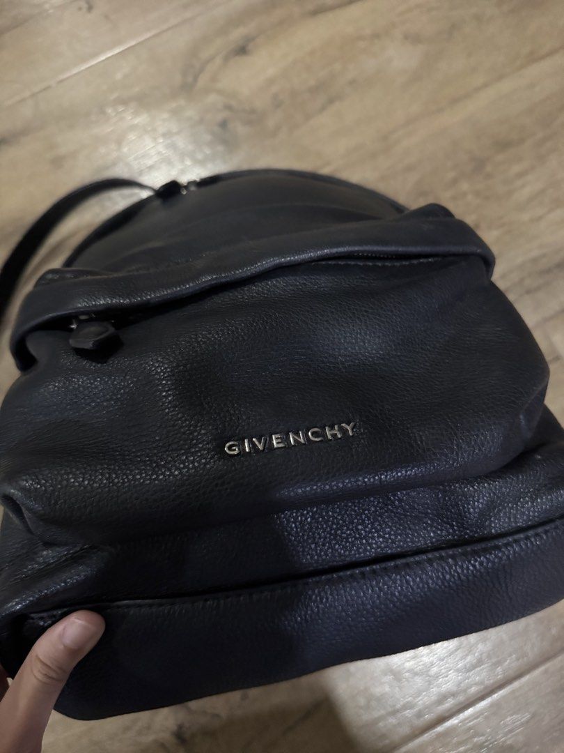 Black Givenchy Backpack (Category: Luxury Bags & Wallets) located in Quezon City. Submitted by eyabanana08 (Listing ID 1454713611, Image 2). Description: - givenchy black backpack - no discoloration or pain chipping - minor flaw is leather is a bit used - still good condi - authentic money back if proven fake - price is nego.