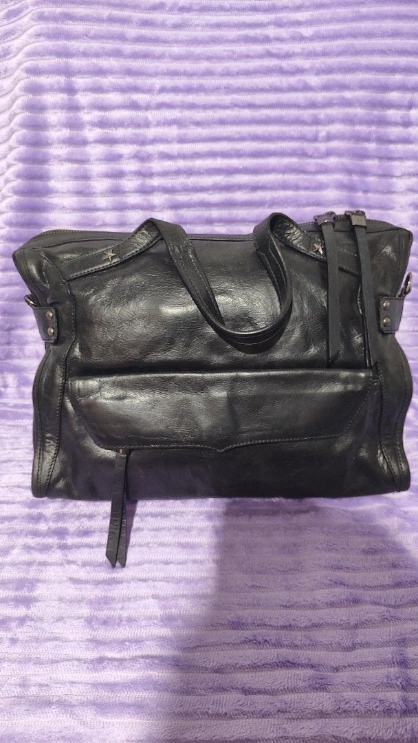 Black Leather Tote Bag with Studs (Category: Tote Bags) located in Manila. Submitted by thecalvinedit (Listing ID 1454746827, Image 1). Description: - Genuine black leather tote bag - Secure zippered main compartment - Convenient exterior zippered pocket - Interior magnetic snap closure pocket - Elegant silver hardware details - Comfortable straps for shoulder or hand carry - Ample space for daily essentials * no sling, but can be replaced..