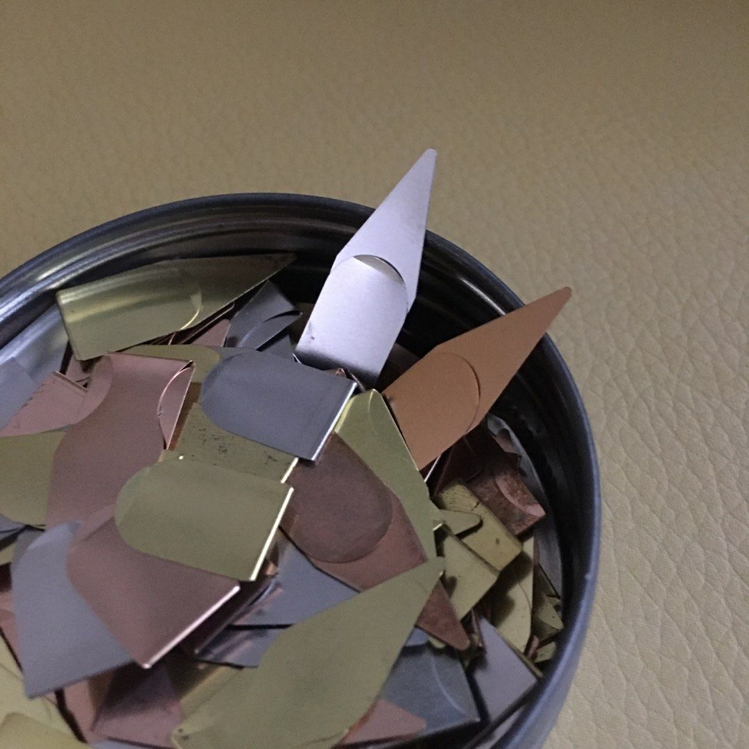 Book Darts Paper-thin Metal Clip Marker (Category: Craft Supplies & Tools) located in Tarlac. Submitted by greatfindstrlc (Listing ID 1454661068, Image 3). Description: Ultra-thin bronze, brass or stainless steel book marker clips. Not sure about the exact quantity but still fairly full to its tin container. Made in Oregon, USA.