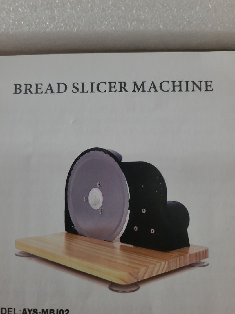 Bread slicer machine (Category: Breadmakers) located in Singapore. Submitted by timeattack (Listing ID 1454573254, Image 1). Description: Brand new in box.