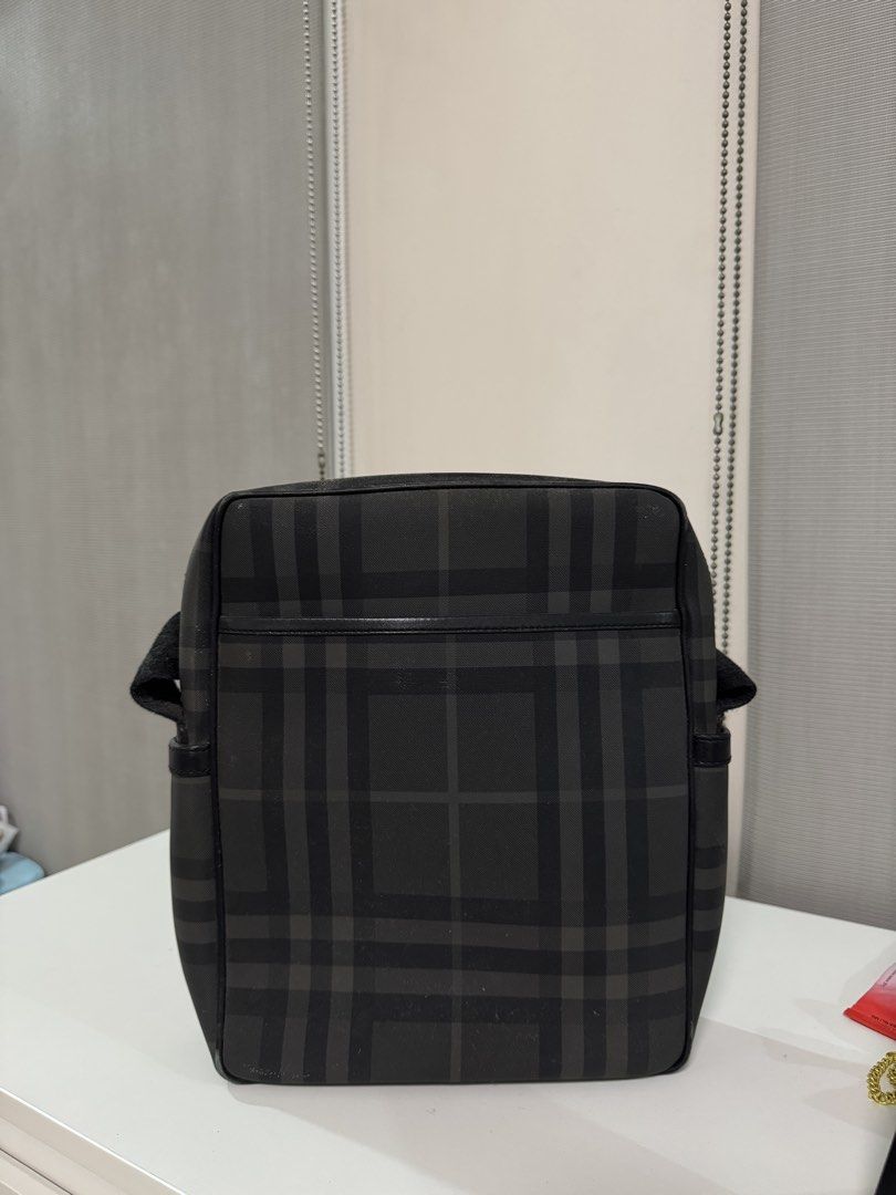 Burberry Nova Check Crossbody Bag (Category: Luxury Bags & Wallets) located in Quezon City. Submitted by shop.lize (Listing ID 1454611386, Image 1). Description: - Classic Burberry crossbody bag - Iconic Nova Check pattern (black & grey) - Adjustable strap for comfort - Secure zip closure main compartment - Interior zip pocket - Ideal for everyday use.
