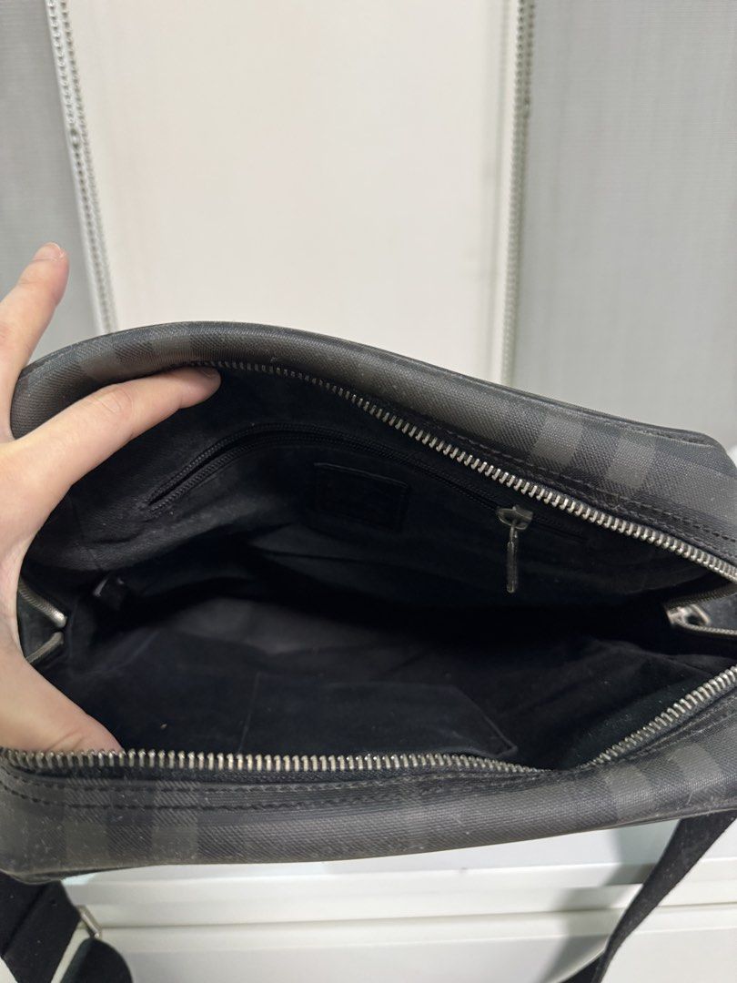 Burberry Nova Check Crossbody Bag (Category: Luxury Bags & Wallets) located in Quezon City. Submitted by shop.lize (Listing ID 1454611386, Image 3). Description: - Classic Burberry crossbody bag - Iconic Nova Check pattern (black & grey) - Adjustable strap for comfort - Secure zip closure main compartment - Interior zip pocket - Ideal for everyday use.