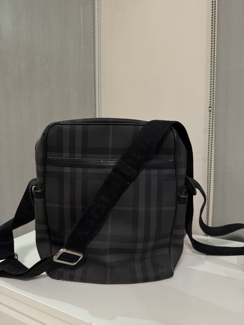 Burberry Nova Check Crossbody Bag (Category: Luxury Bags & Wallets) located in Quezon City. Submitted by shop.lize (Listing ID 1454611386, Image 2). Description: - Classic Burberry crossbody bag - Iconic Nova Check pattern (black & grey) - Adjustable strap for comfort - Secure zip closure main compartment - Interior zip pocket - Ideal for everyday use.
