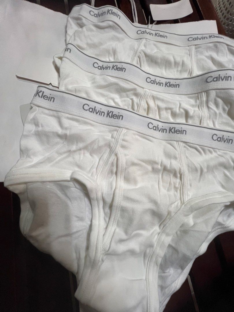 Calvin Klein White Cotton Briefs - Size M (3 Pack) (Category: Underwear) located in Manila. Submitted by Patriciogastala (Listing ID 1454717198, Image 1). Description: - Pack of 3 Calvin Klein briefs - Classic white cotton - Elastic waistband with iconic Calvin Klein logo - Size M (fits 175/80cm) - Comfortable for everyday wear - Essential wardrobe staple.