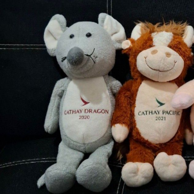 Cathay Pacific Animals Plush Toys (Category: Plushies & Soft Toys) located in Baliuag. Submitted by ahgashop. (Listing ID 1438781857, Image 1). Description: - Adorable Cathay Dragon and Cathay Pacific plush toys - ox (2021), and rat (2020). SOLD -pig - Perfect for Cathay Pacific lovers and collectors.