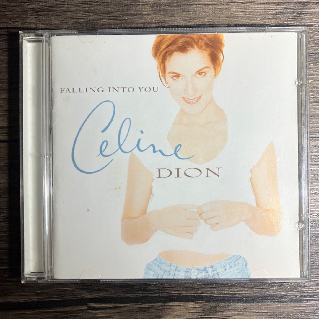 Celine Dion Falling Into You CD (90s) (Category: CDs & DVDs) located in Makati City. Submitted by zek2zoe (Listing ID 1454712442, Image 1). Description: Selling from my personal/family collection. - CD/case in very good and working condition - Original, Pressed in Canada, year 1996 Reason for selling: - Declutter and make room for storage - Celine Dion's 'Falling Into You' CD - Includes hit songs: 'It's All Coming Back to Me Now', 'Because You Lo