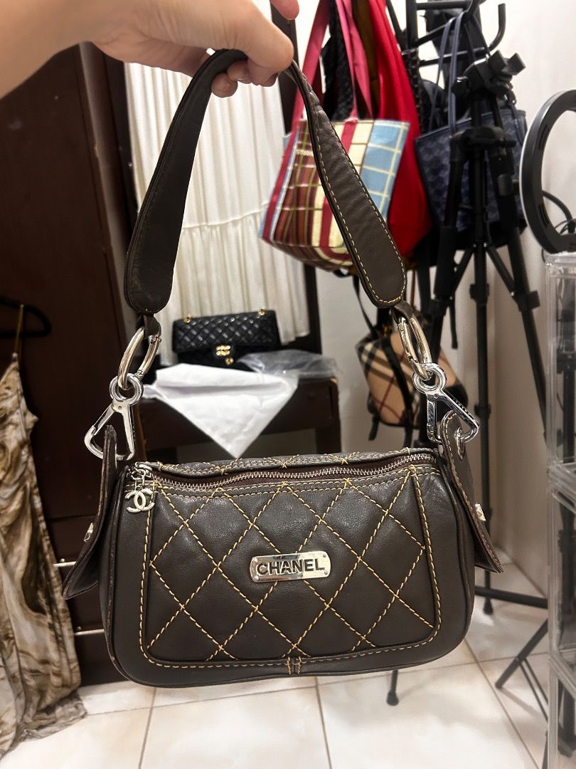 Chanel Quilted Leather Shoulder Bag Dark Brown (Category: Luxury Bags & Wallets) located in Caloocan City. Submitted by delutanaom52298 (Listing ID 1454685988, Image 1). Description: - Dark brown quilted leather with contrast stitching - Silver hardware details - Zipper closure - Interior zippered pocket - Small and compact size - Ideal for everyday use.
