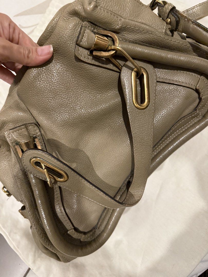 Chloe Paraty bag (Category: Luxury Bags & Wallets) located in Manila. Submitted by pam.pam4 (Listing ID 1421967685, Image 2). Description: - Authentic Chloe Paraty handbag - taupe color - Includes dust bag and tags - Top handle - Gold-tone hardware - Made of leather - Classic and stylish design Condition used.