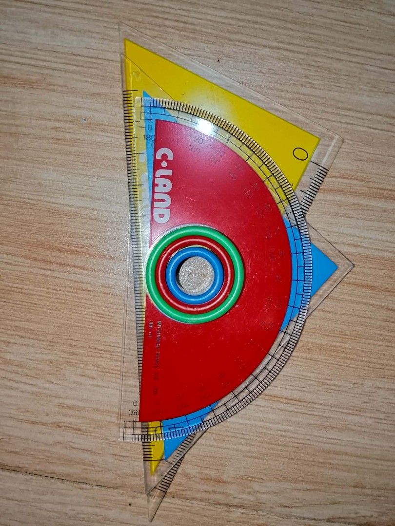 C-LAND Geometry Set - Protractor and Set Squares (Category: Stationery & School Supplies) located in Pasig City. Submitted by cityshopperph (Listing ID 1454681636, Image 2). Description: - C-LAND Geometry Tool Set - Includes: 1 Red Protractor, 1 Yellow Set Square, 1 Blue Set Square - Ideal for schoolwork and drafting - All pieces feature clear measurement markings.