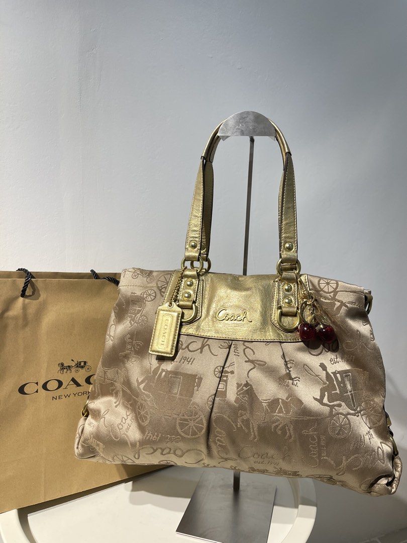 Coach Ashley Satchel Horse and Carriage Pattern (Category: Shoulder Bags) located in Dasmarinas. Submitted by abramdeclutters (Listing ID 1454712137, Image 1). Description: Condition: 9/10 - 2 way strap!! (strap included) - guaranteed authentic - clean creed and hangtag - ykk zipper, clean interior - can fit your essentials, very spacious - normal signs of usage kindly refer to the photos posted * charms not included * slightly nego, drop ur offe