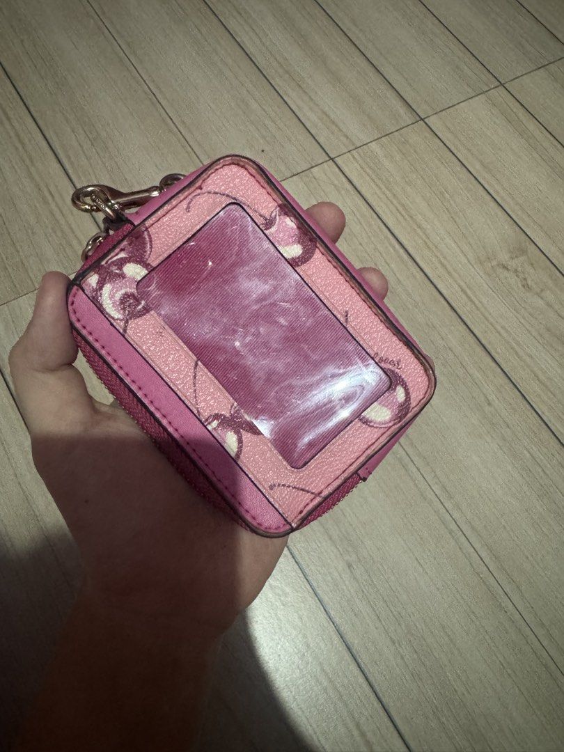 coach cherry pink wallet (Category: Wallets & Card holders) located in Malabon City. Submitted by nanayinah (Listing ID 1454679768, Image 2). Description: - no flaws but i used it for a long time thats why the well used - orig but no box and receipt - with free cute cherry keychain also.