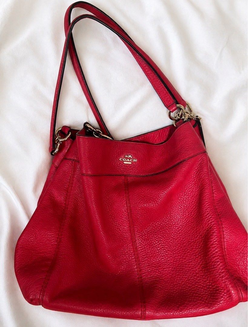 Coach Lexy Raspberry Red Pebbled Leather Shoulder Bag (Category: Luxury Bags & Wallets) located in Las Pinas. Submitted by pinksparkles1830 (Listing ID 1454738555, Image 1). Description: AUTHENTIC❤️ Coach Lexy Raspberry Red Pebbled Leather Shoulder Bag - Genuine red leather Coach shoulder bag - Spacious interior with zip and slip pockets - Elegant gold hardware details (No Scratches) Note: minor wear on Creed (as shown in photos) this is a normal