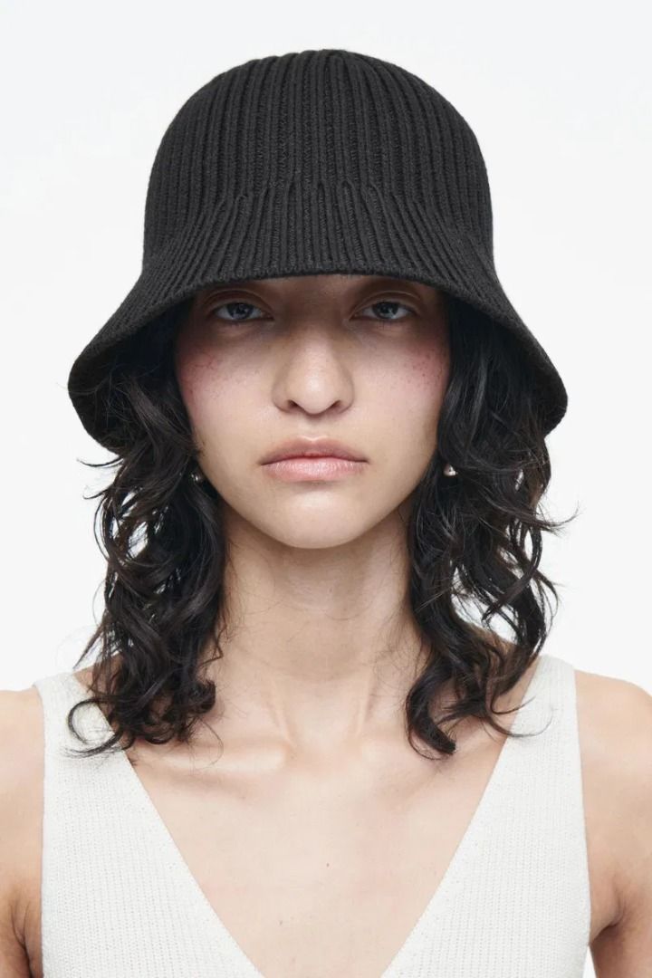 COS Ribbed Knitted Bucket Hat (Category: Hats & Beanies) located in Taytay. Submitted by fromdoolig (Listing ID 1454740202, Image 1). Description: COS Ribbed Knitted Bucket Hat New Condition Color: Black No Issue Price: 580+SF Mode of Payment: Gcash/Unionbank only [Payment First] Courier Service: JNT only [No Cop/d] Lalamove: Customer shall shoulder all fees.