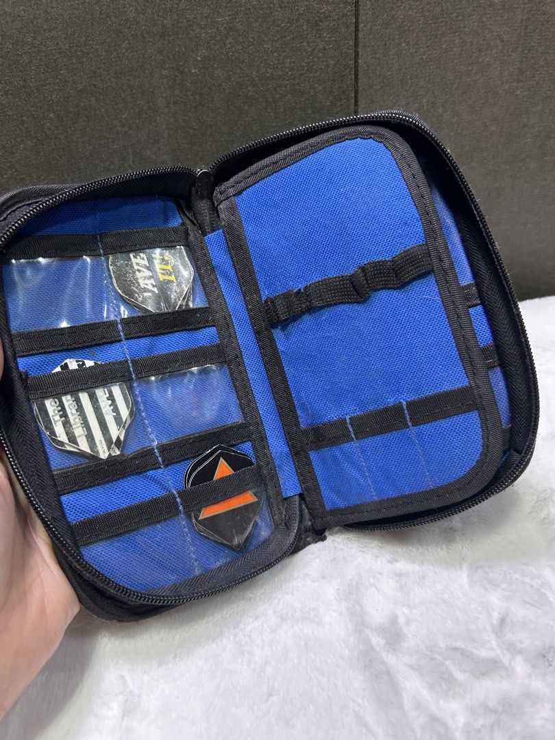 Datadart Dart Flights and Case (Category: Other Sports Equipment and Supplies) located in Manila. Submitted by starbalesukandjapansurplus (Listing ID 1454751128, Image 2). Description: - Set of Datadart dart flights - Assorted designs and colors included - Comes with a Datadart carrying case - Case features multiple compartments for organized storage - Ideal for replacing worn-out flights or trying new designs.