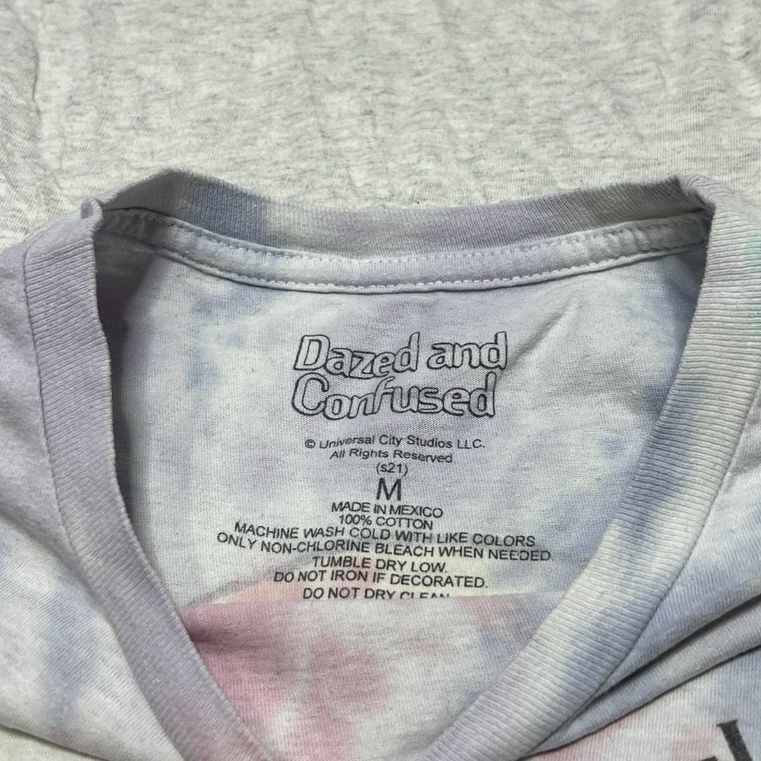 Dazed and Confused Tie-Dye Graphic Tshirt Men Medium (Category: Tshirts & Polo Shirts ) located in Talisay. Submitted by sidequested.archive (Listing ID 1454724246, Image 3). Description: 🏷️ Item Code: SQ106bx2 📝Details • Condition: Pre-loved, overall good condition with normal signs of wear. Graphics still look vibrant. • Color rating: 9/10 • Size: Medium (on tag; see measurements for accuracy) • Measurements (in inches): 21’ W × 29’ L Overall