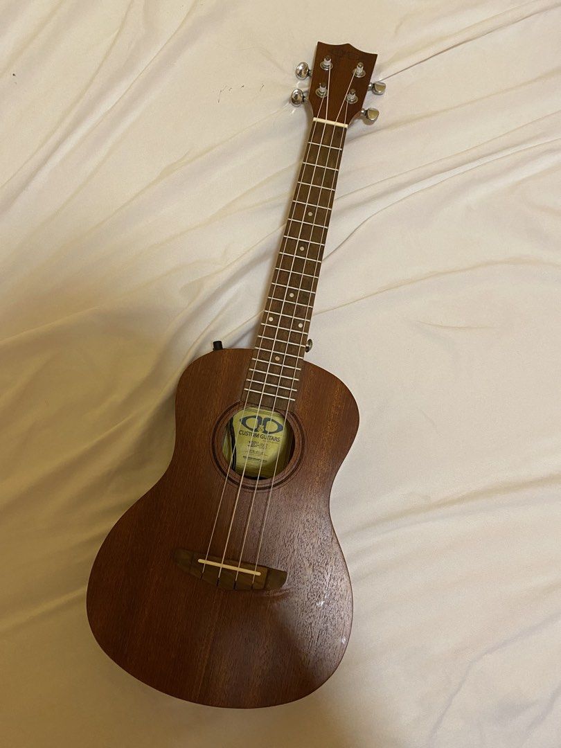 D&D custom guitars Ukulele (Category: Musical Instruments) located in Bulacan. Submitted by callioppe (Listing ID 1454669384, Image 1). Description: - with free capo & picks.