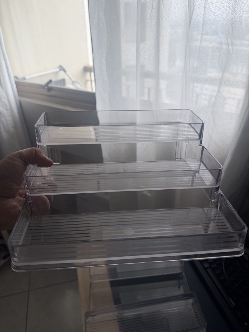 Desktop Storage Shelf 3 Tiers Clear Acrylic (Category: Storage Boxes & Baskets) located in Quezon City. Submitted by juvyjuvydoo (Listing ID 1454635940, Image 2). Description: - 3-tier clear acrylic desktop storage shelf(4 pieces) - Ideal for organizing makeup, skincare, perfume, popmart and other desk essentials - Helps keep your space tidy and clutter-free - Easy to clean and maintain - Perfect for vanities, desks, or any workspace.