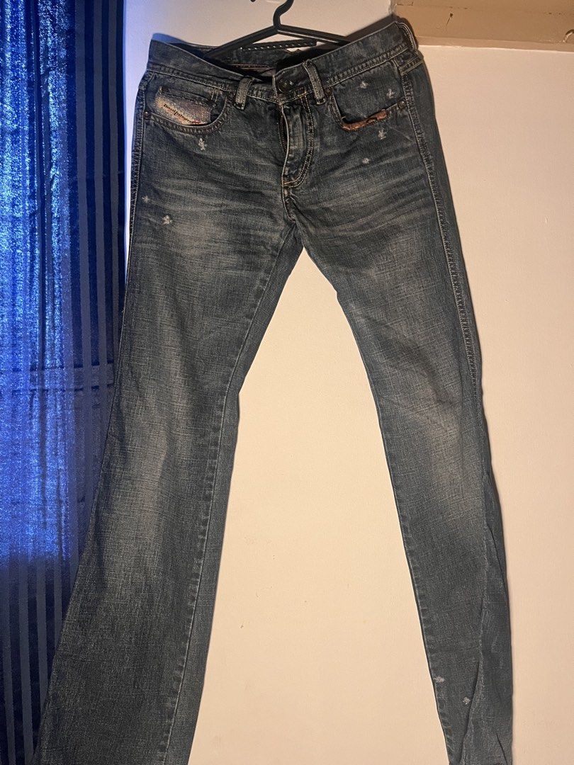 Diesel Industry Denim Division Jeans (Category: Jeans) located in Las Pinas. Submitted by ssaii_ (Listing ID 1454613354, Image 1). Description: - Authentic Diesel Bootcut Jeans - Size: 24 - Made in Italy - Classic blue denim with a slightly distressed finish - Button fly closure - Ideal for everyday wear - Feel free to ask questions! Dimes 28-30in Waist 40in Lenght 8in Front rise 10.5in Back rise 32in Inseam.