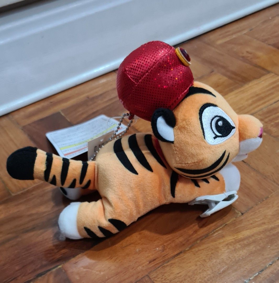Disney Tokyo Resort Tiger Plush Keychain (Category: Plushies & Soft Toys) located in Manila. Submitted by lc_declut (Listing ID 1454664153, Image 2). Description: - Authentic Tokyo Disney Resort tiger plush toy. - clips to t-shirt shoulder - original tags attached. - Makes a wonderful gift or addition to any collection..
