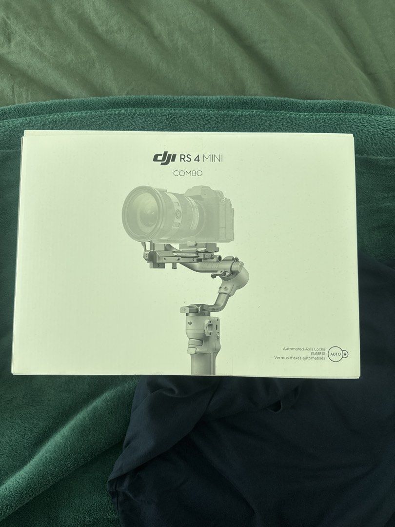 DJI RS 4 Mini Combo with Box (Category: Gimbals & Stabilizers ) located in Manila. Submitted by lodburger (Listing ID 1454603108, Image 2). Description: - DJI RS 4 Mini Combo - Includes gimbal, handle, and accessories shown in case - Original box included - Achieve smooth, professional video shots.
