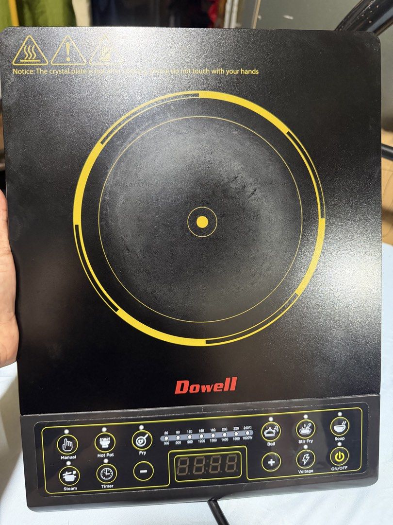 Dowell Induction Cooker ICS0037BK (Category: Cookers) located in Manila. Submitted by mostonal1986447 (Listing ID 1454629906, Image 1). Description: - Dowell Induction Cooker ICS0037BK - Multiple Cooking Functions: Steam, Hotpot, Fry, Stir Fry, Soup - Built-in Timer and Voltage Settings - Durable Crystal Plate (Caution: Do not touch when hot) - Efficient Cooling Fan at the Bottom - Power: 230V, 50Hz.