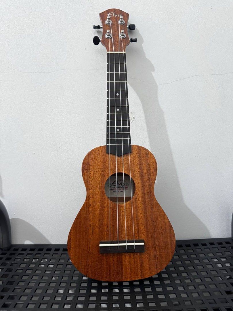 Elvis Ukulele (Category: Musical Instruments) located in San Fernando. Submitted by _itsmedani (Listing ID 1454586322, Image 1). Description: - Elvis Ukulele - Model: 1991/1999 - Body Material: Mahogany - Ideal for: Beginners - Condition: Brandnew/Unused From Japan.