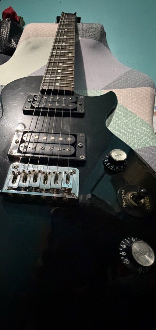 Epiphone Les Paul with Amps (Category: Musical Instruments) located in Quezon City. Submitted by del.qc (Listing ID 1454576403, Image 2). Description: Epiphone Les Paul Special electric guitar - Classic black finish - Iconic Les Paul body shape Includes: Marshall Amplifier 10w and Deviser Amp 30w Minor rust issues due to storage but 100% working, ready for the next owner..
