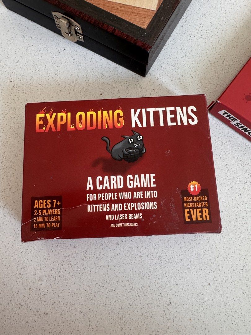 Exploding kittens (Category: Board Games & Puzzles) located in Singapore. Submitted by geeem124 (Listing ID 1454577417, Image 1). Description: .
