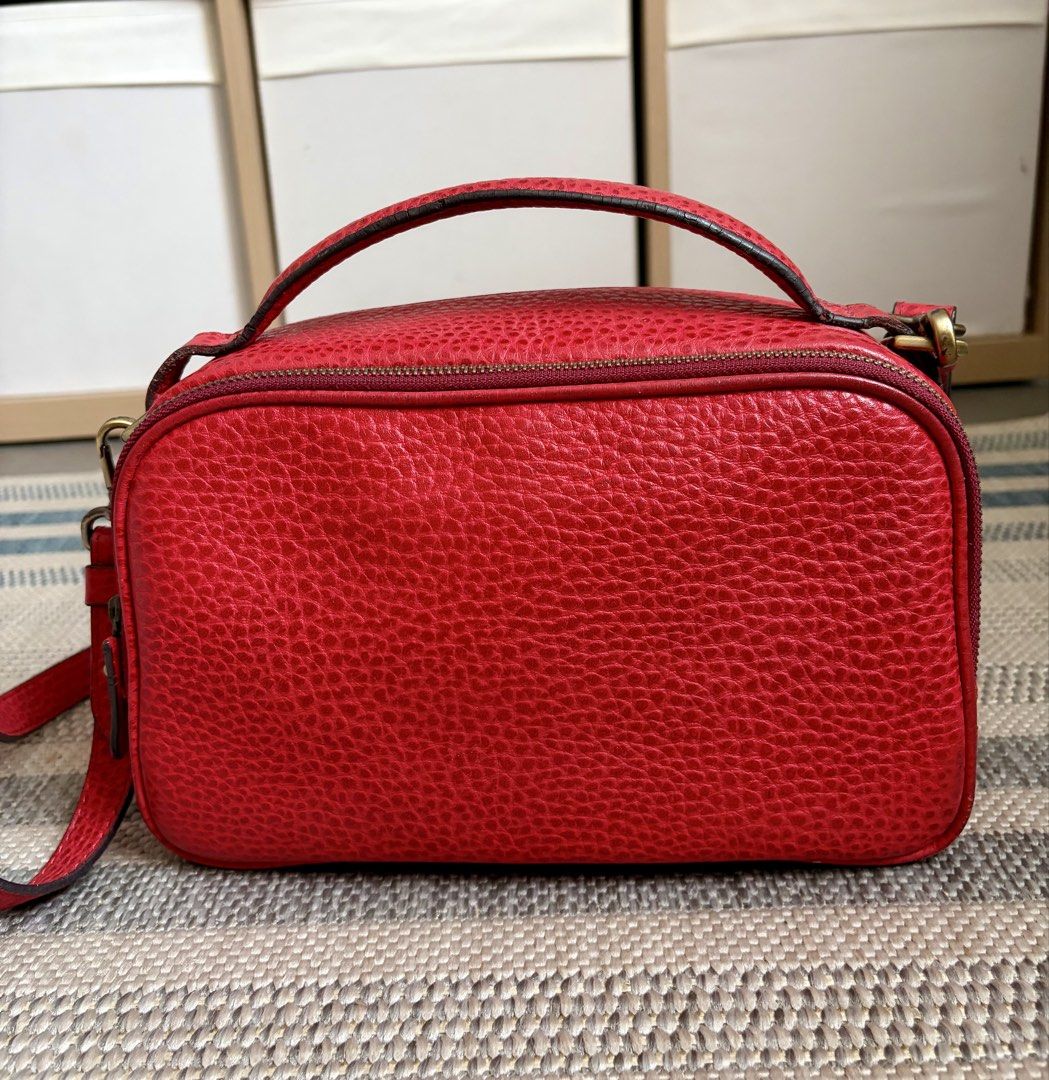 FINO LEATHERWARE Pebbled Leather Crossbody Camera Bag (Category: Cross-body Bags) located in Mandaluyong City. Submitted by kayec93 (Listing ID 1454623070, Image 3). Description: Beautiful Fino Leatherware crossbody camera bag in red pebbled leather with a classic, structured design and metallic Fino brand plate. A great everyday bag for anyone who loves a stylish, timeless leather piece. Condition: lightly used and well-loved * Approx. 27 × 17 ×
