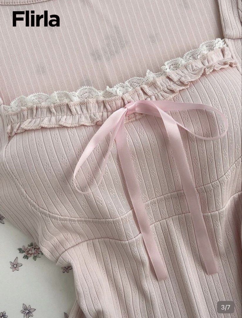Flirla Pink Puff Sleeve Square Neck Top with Bow (Category: Blouses) located in Caloocan City. Submitted by nessymawi (Listing ID 1454623586, Image 2). Description: - Cute pink top from Flirla - Features puff sleeves and a square neckline - Adorned with lace trim and a front ribbon bow detail - Made from comfortable ribbed material - Ideal for a sweet and feminine look - Refer to size chart for exact measurements RFS: Wrong size 😔.